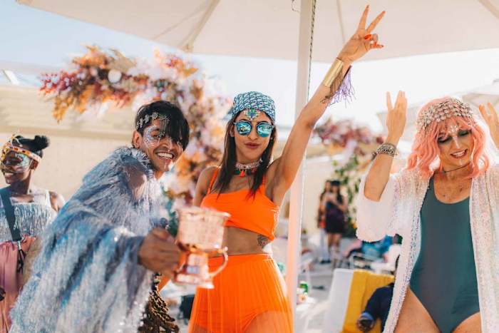 Guests partying on the beach in Dubai.